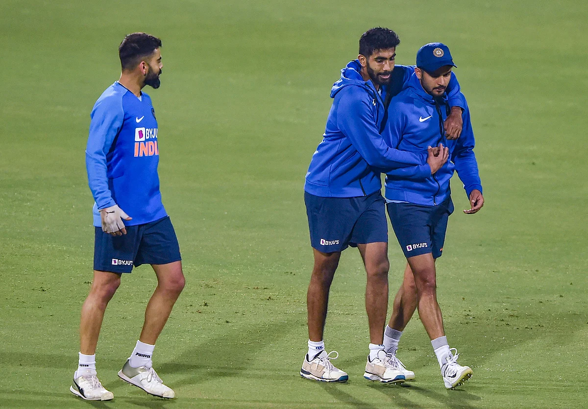 Indian skipper Virat Kohli with teammates Jasprit Bumrah and Manish Pandey during a practice session ahead of the 1st T20 cricket match against Sri Lanka, at Barsapara Cricket Stadium in Guwahati.