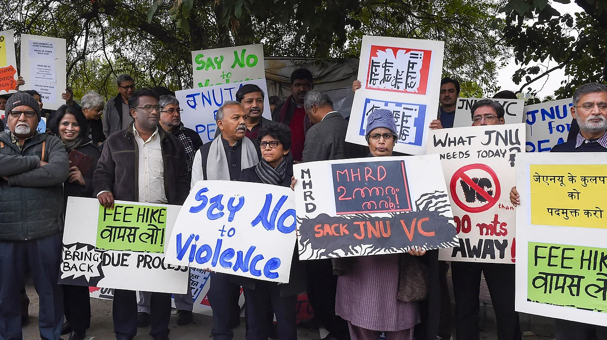 JNU teachers stage a protest over the violence on campus, in New Delhi.