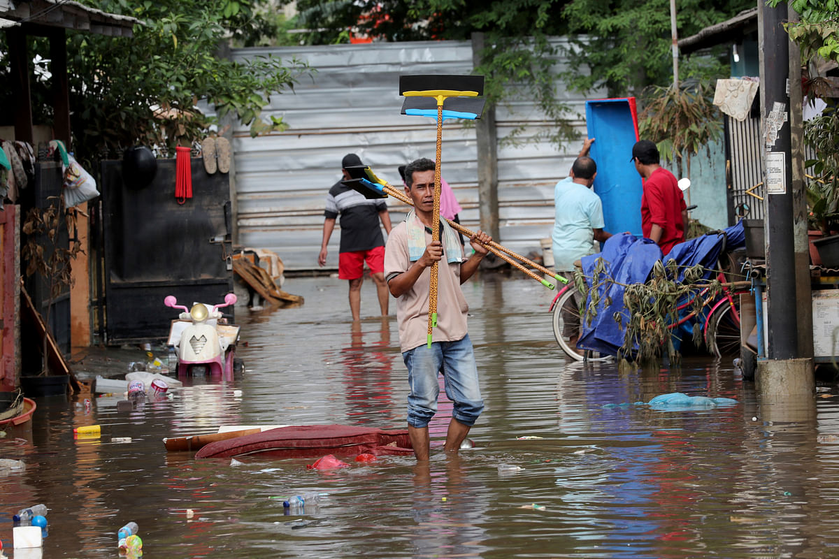 Tens of thousands of Indonesians were crammed in emergency shelters, waiting for floodwaters to recede in Jakarta.