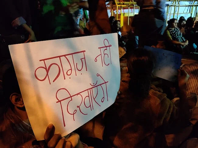 Protester holding signs against the controversial Citizenship Amendment Act (CAA), National Registry of Citizens (NRC) and National Population Register (NPR).