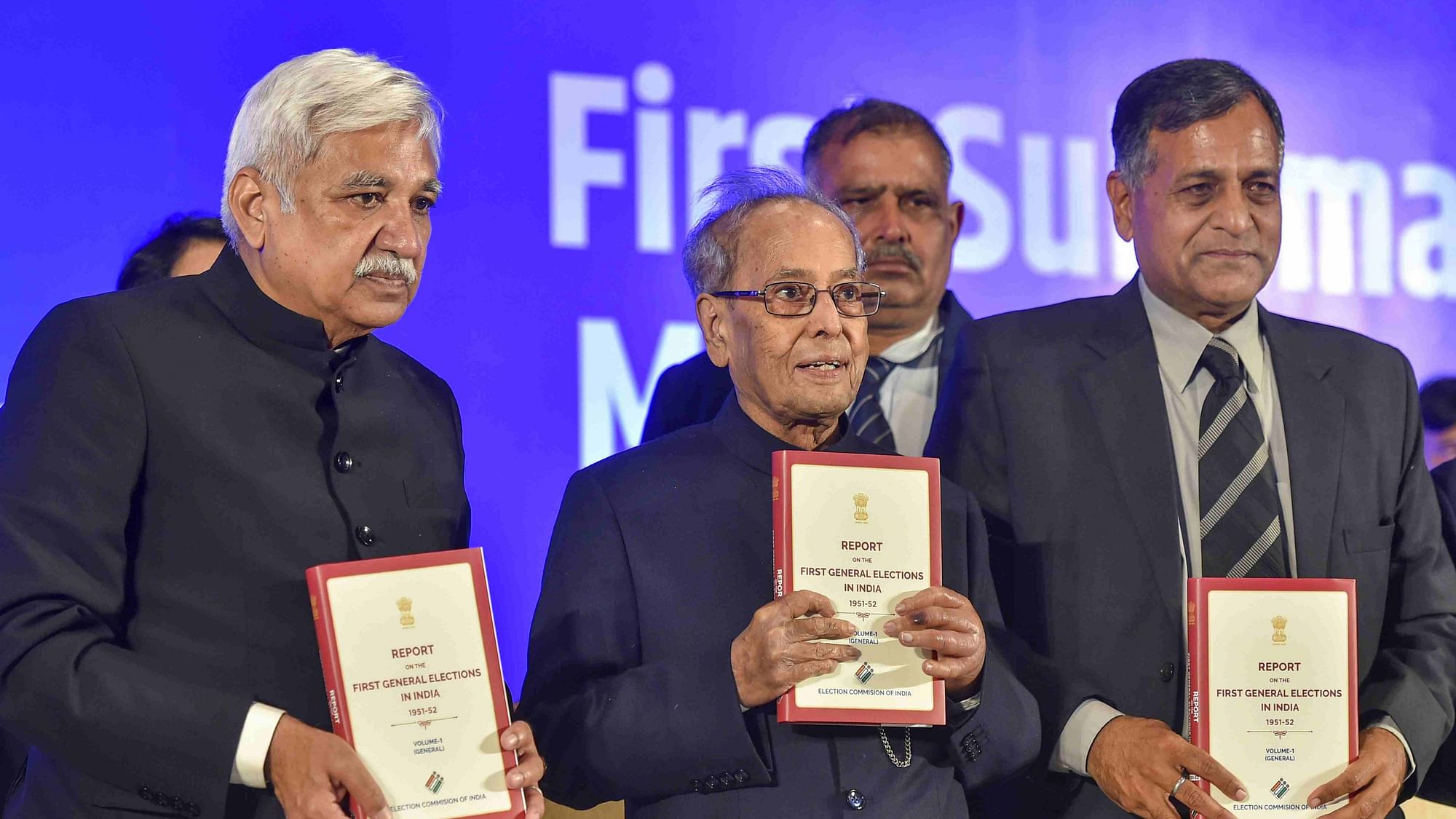 Former President Pranab Mukherjee with Chief Election Commissioner Sunil Arora and Election Commissioner Ashok Lavasa release a book in New Delhi on 23 January. &nbsp;