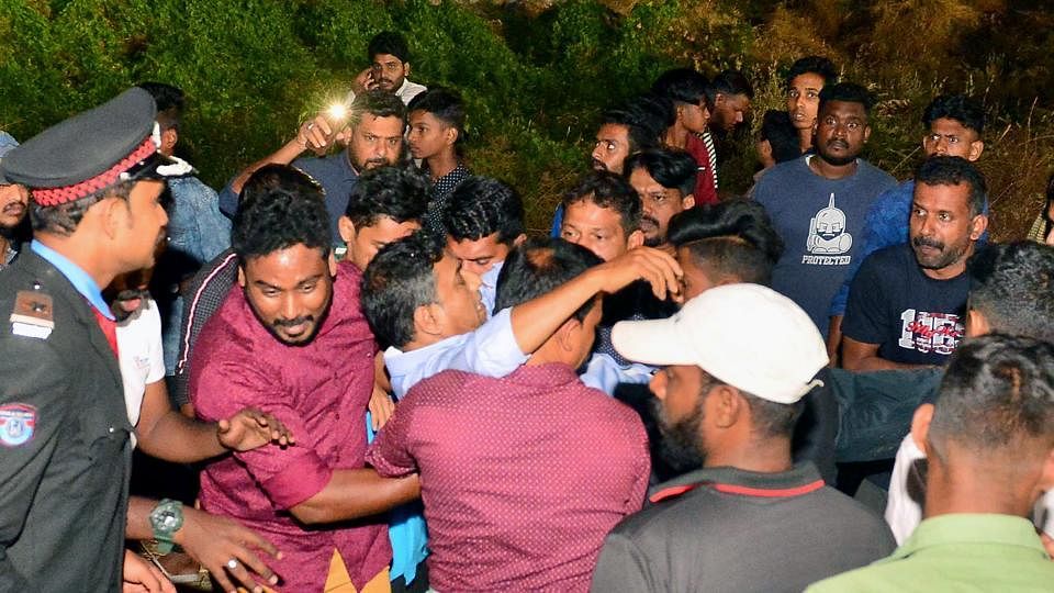 People rescuing an injured as a gallery of the stadium crashed and injured at least 50 people during a Charity Football Match in Palakkad on Sunday, 19 January. 