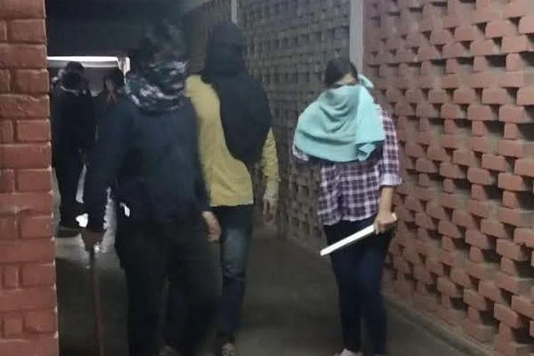 A screenshot of the masked mob attacking students and vandalising JNU’s Sabarmati Hostel.