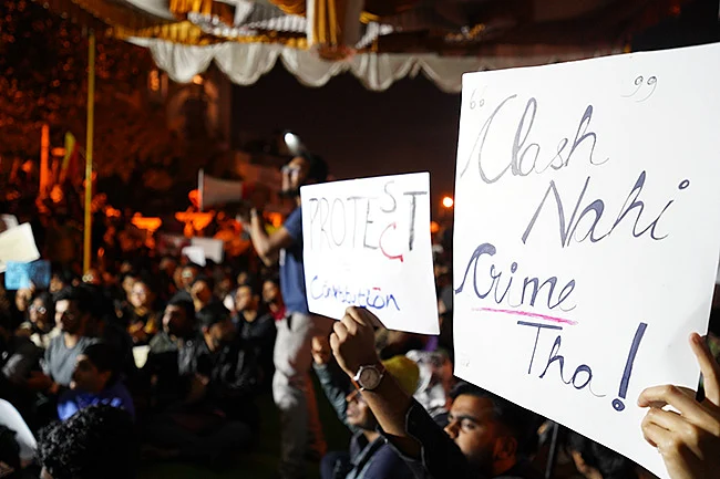 Protesters holding placards condemning the attack on JNU students.