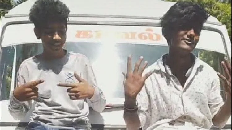 In the 14-second video, two men are seen seated on a police van, moving their lips to a movie dialogue before breaking into song.