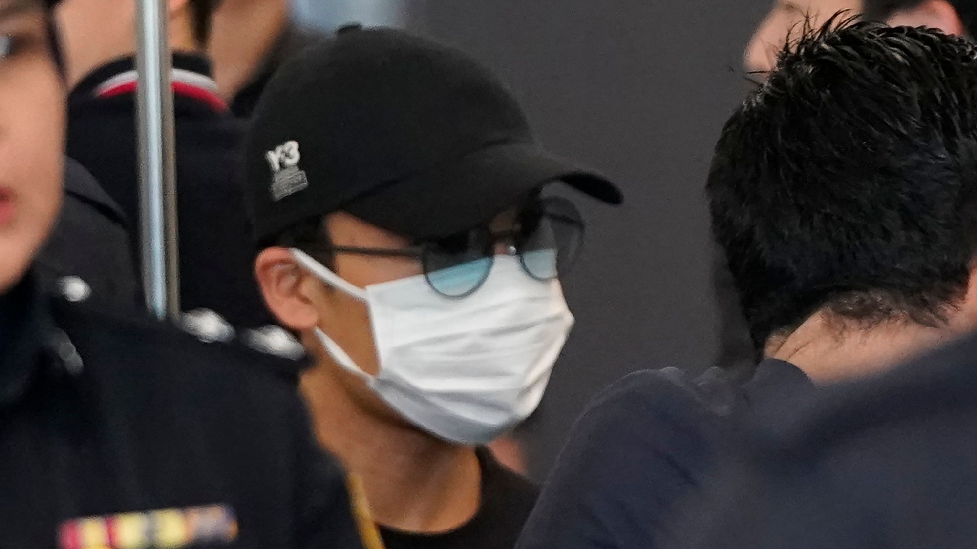 Momota, wearing a dark cap and a face mask, left on a Malaysian Airlines flight to Tokyo’s Narita airport at 9:40 am (0140 GMT).