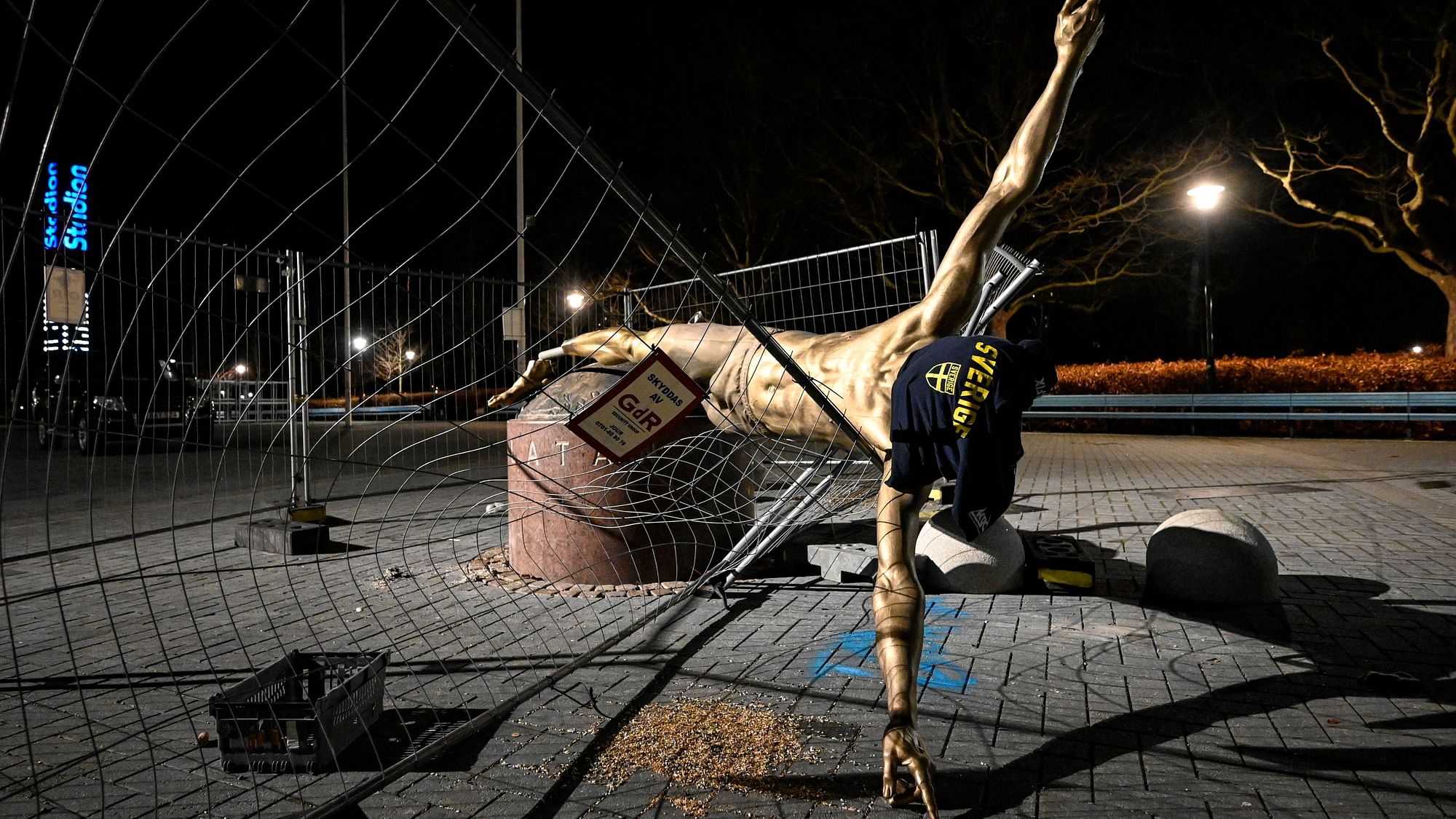 The damaged statue of soccer player Zlatan Ibrahimovic next to Stadion football arena in Malmo, Sweden, Sunday Jan. 5, 2020.