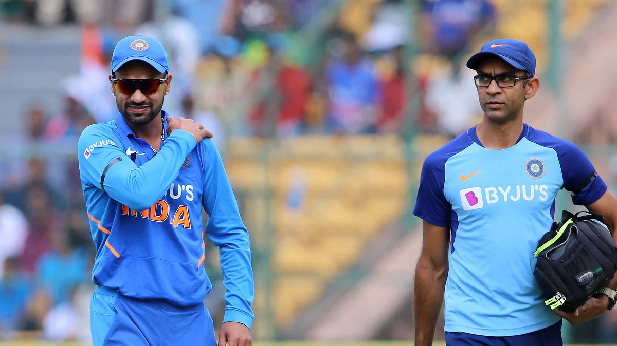 Shikhar Dhawan walks back to the pavalion after he got injured during the 3rd One day International match between India and Australia.