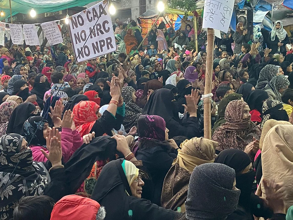 Women gather in Jamnapaar in Delhi to protests against CAA and NRC. 