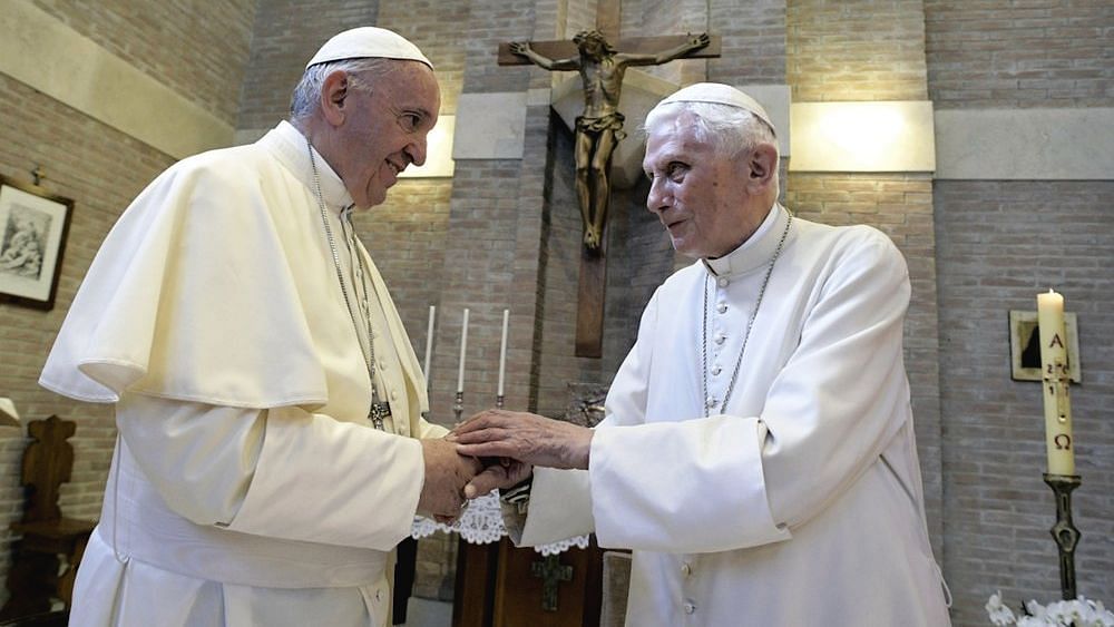  Pope Francis (left) and Pope Benedict XVI, meet each other on the occasion of the elevation of five new cardinals at the Vatican.