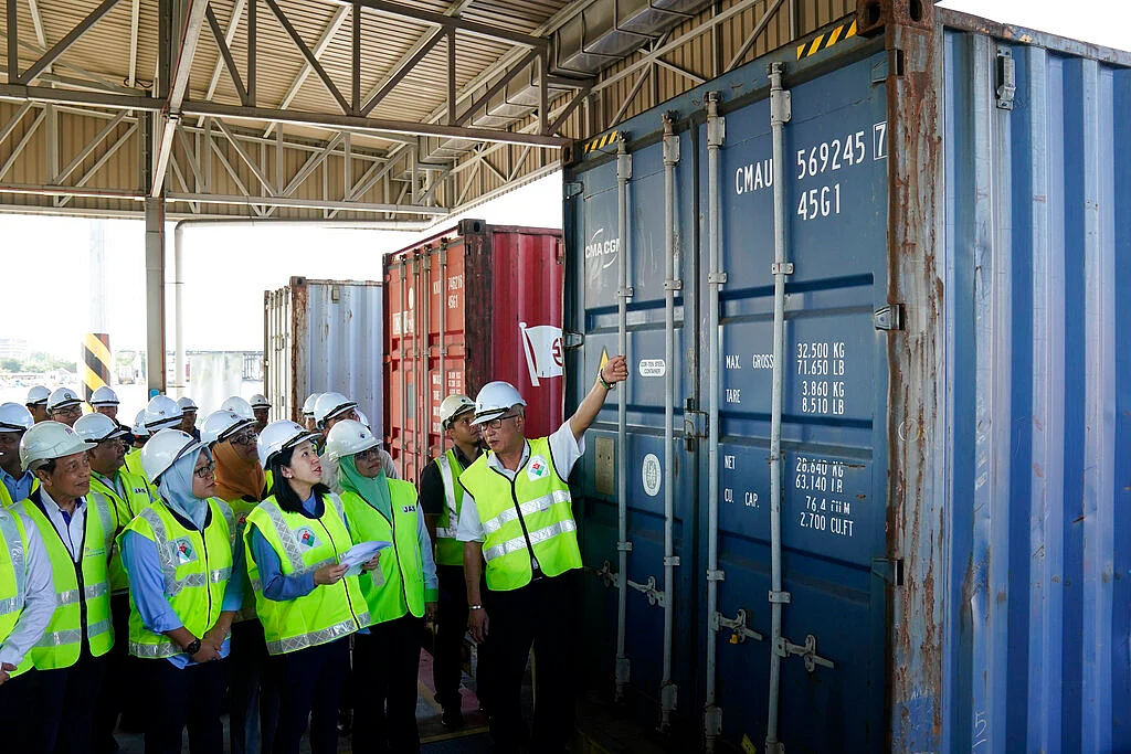 Malaysia’s Environment Minister Yeo Bee Yin, third from left, inspects a container with plastic waste at a port in Butterworth, Malaysia on Monday, 20 January 2020.