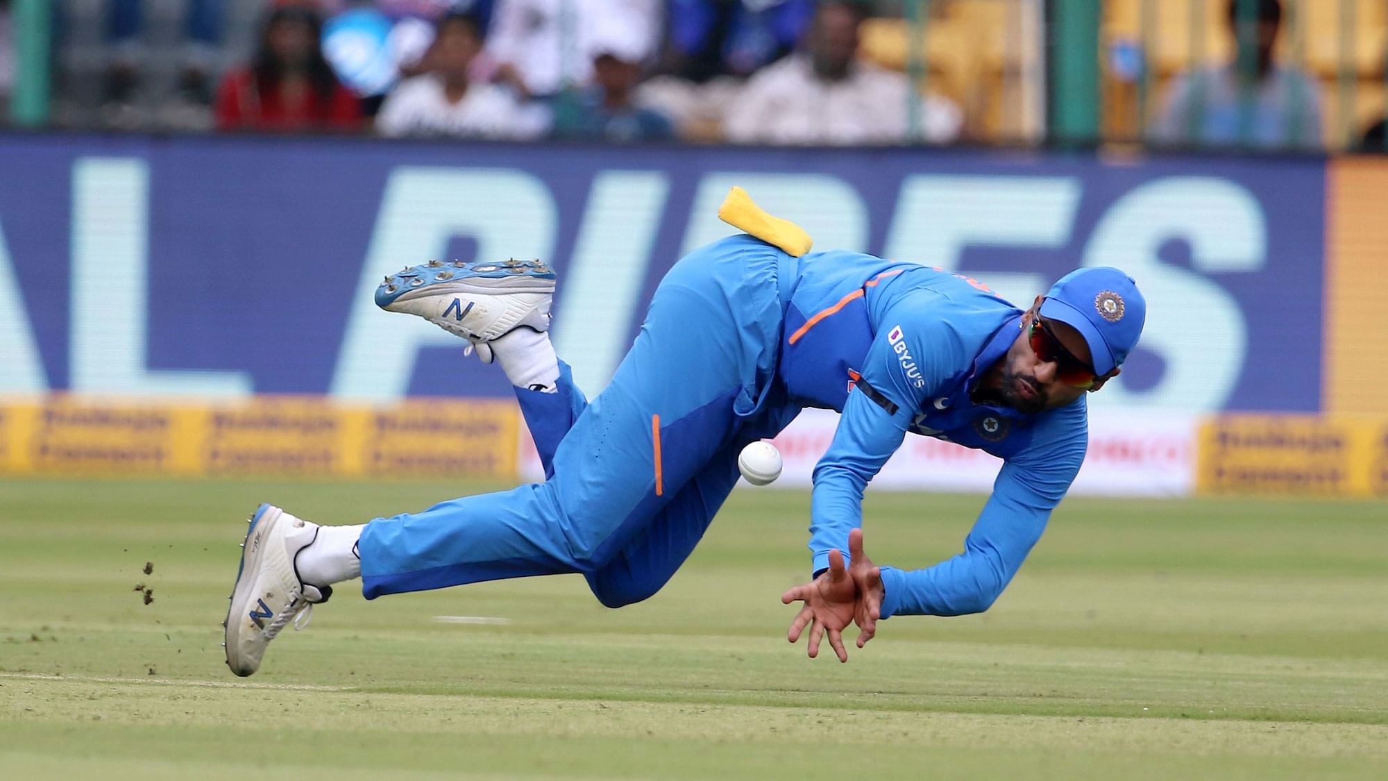 Shikhar Dhawan injured his shoulder after diving to save an Aaron Finch shot in the cover region.