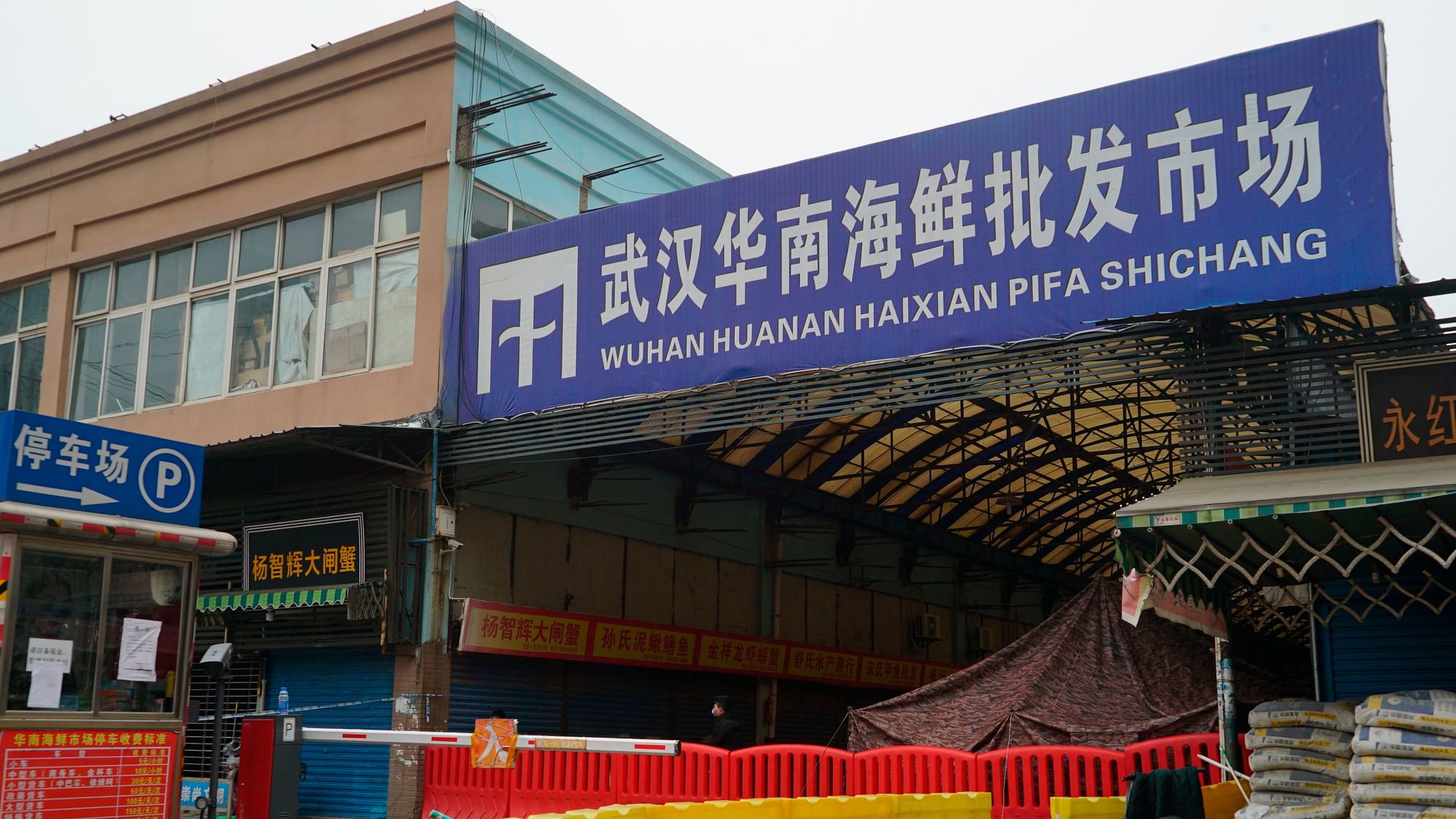 The Wuhan Huanan Wholesale Seafood Market, where a number of people related to the market fell ill with a virus, sits closed in Wuhan, China, Tuesday, Jan. 21, 2020.