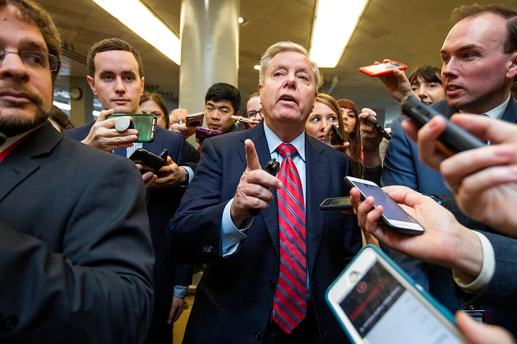 Senator Lindsey Graham speaks to reporters at the Capitol in Washington on 28 January.