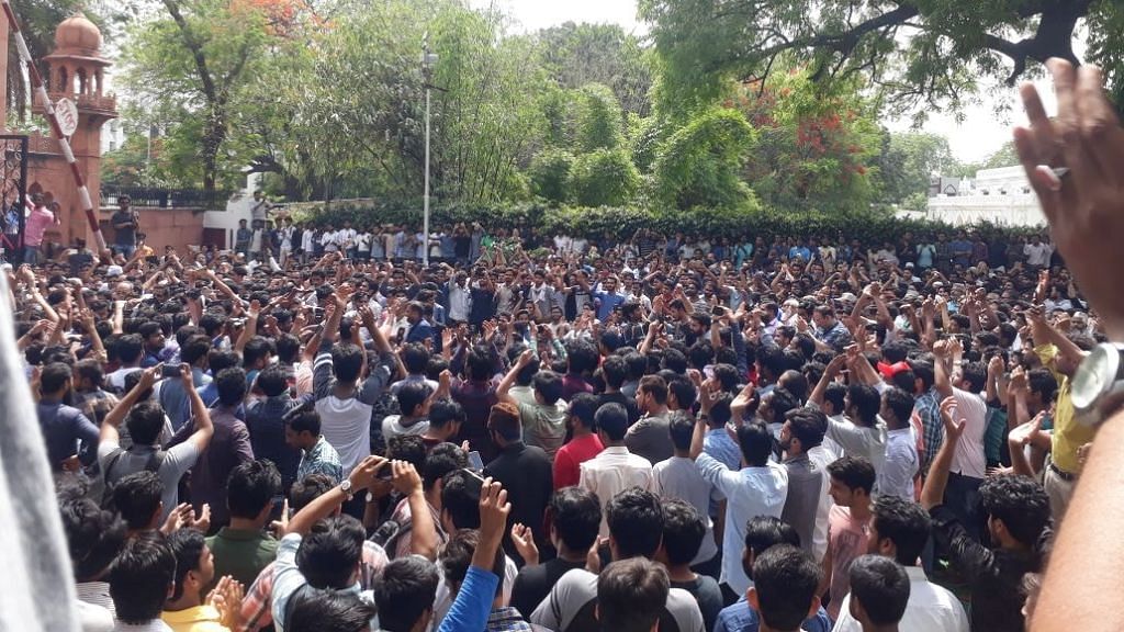 AMU stage a dharna in protest over the violence.&nbsp;