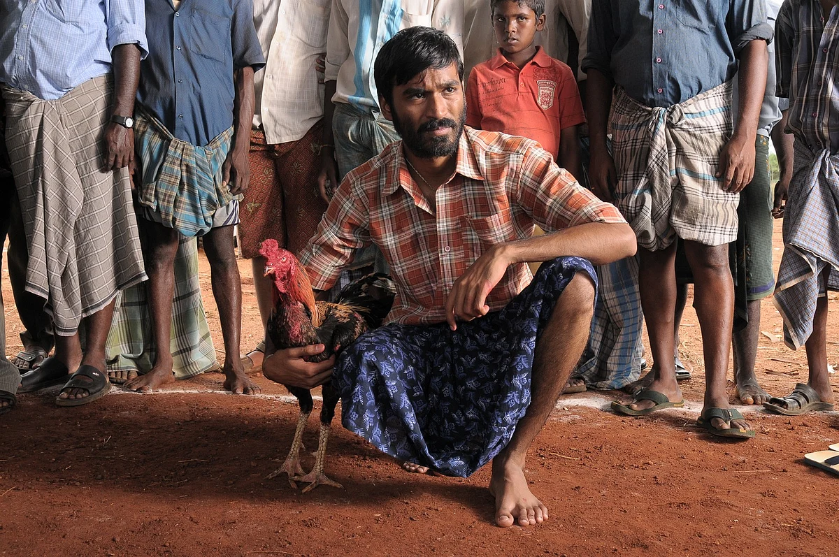 Dhanush in a still from Aadukalam.