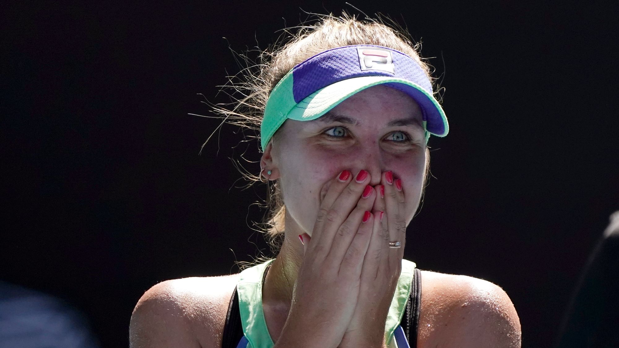 Sofia Kenin is into her first major final (Australia Open) at age 21 - beating the woman ranked No. 1, Ash Barty, to get there.