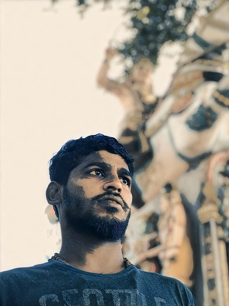 Muthu is a three-time champion bull tamer.
