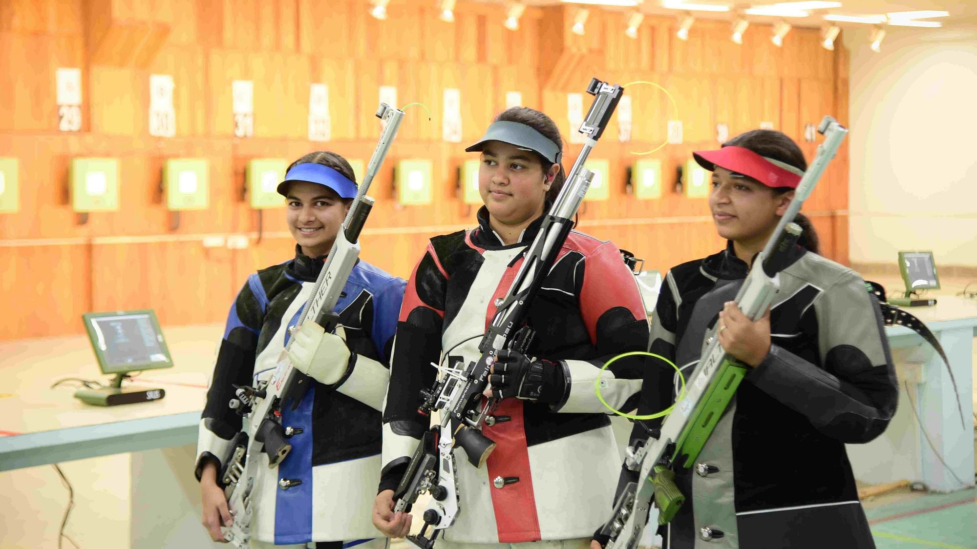 Zeena Khitta (centre) shot 251.3 to bag gold in the 10m Air Rifle category at the Khelo India Youth Games on Tuesday.