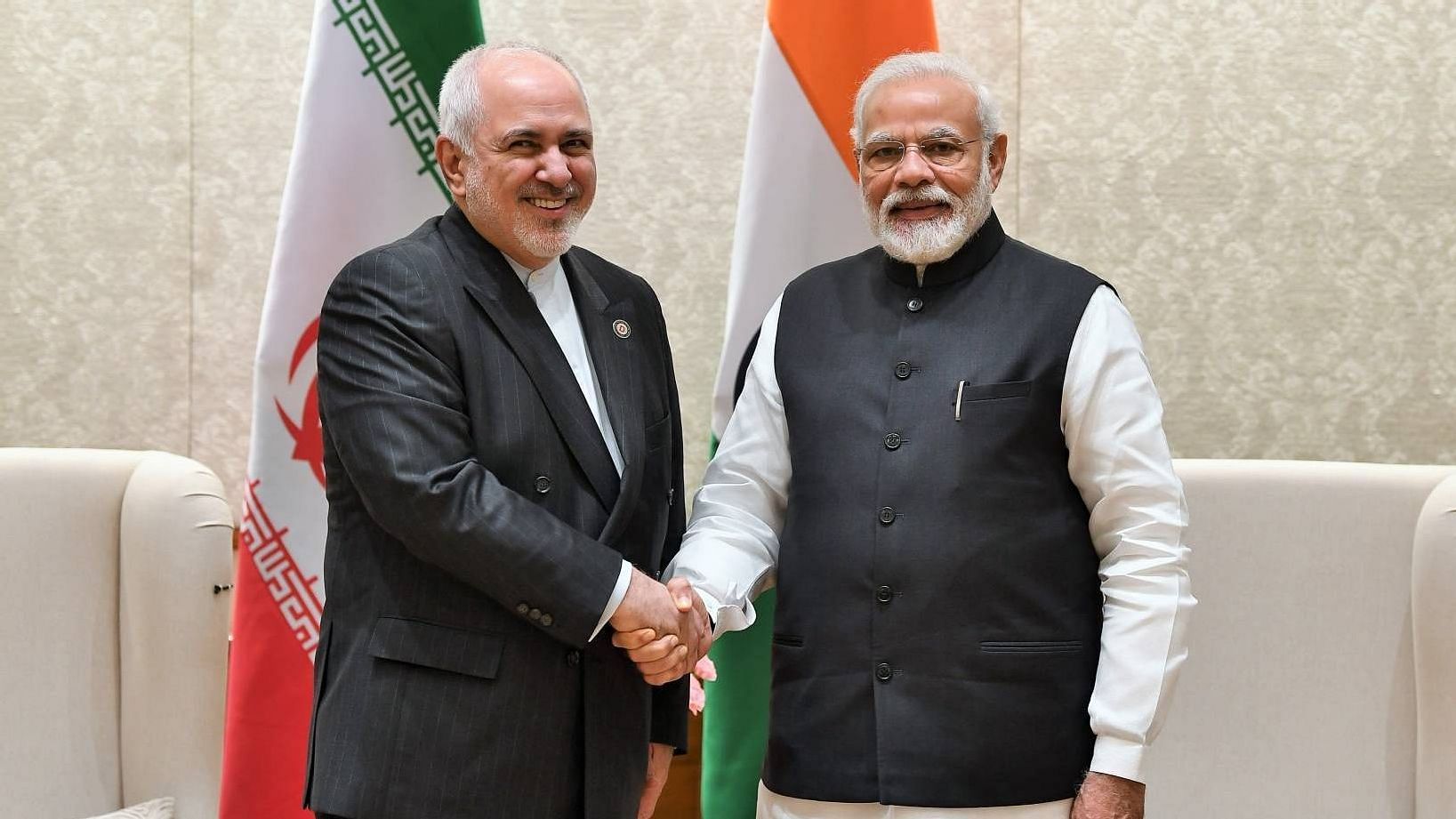 Prime Minister Narendra Modi shakes hands with Iran’s Foreign Minister Javad Zarif at a meeting in New Delhi.