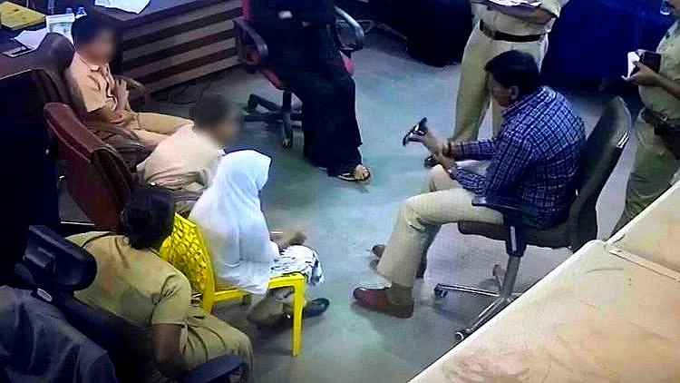 Police interrogating students in Bidar.