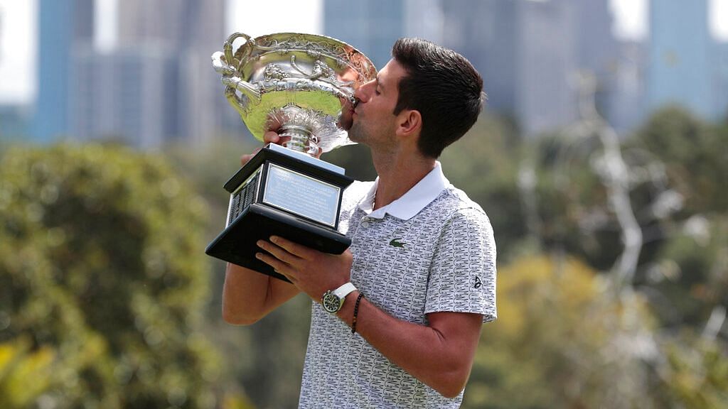 Serbian Novak Djokovic defended his Australian Open crown by beating Dominic Thiem in a gripping five-set final on Sunday.
