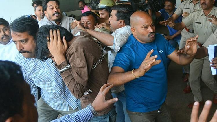 Kashmiri students being roughed by allegedly right-wing groups, as they were being produced in the Hubballi court on Monday, 17 February.