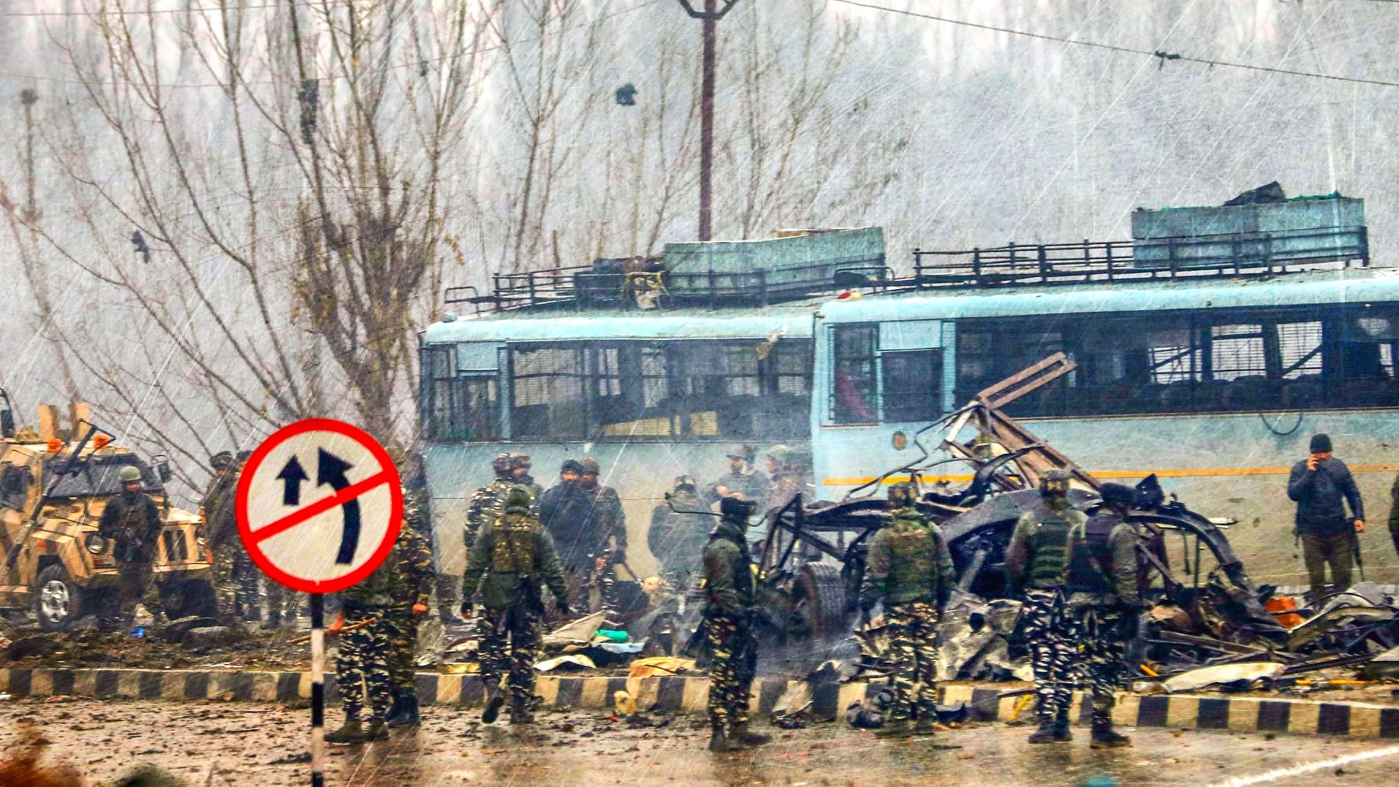 Security personnel carry out rescue and relief work at the site of the suicide bomb attack in Pulwama district of J&amp;K on 14 February.&nbsp;