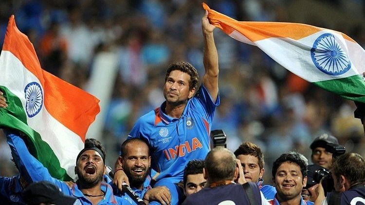 Carried on the shoulders of the Indian team, Sachin Tendulkar made a lap of honour, shedding tears of joy after the victory was sealed in his home city of Mumbai.