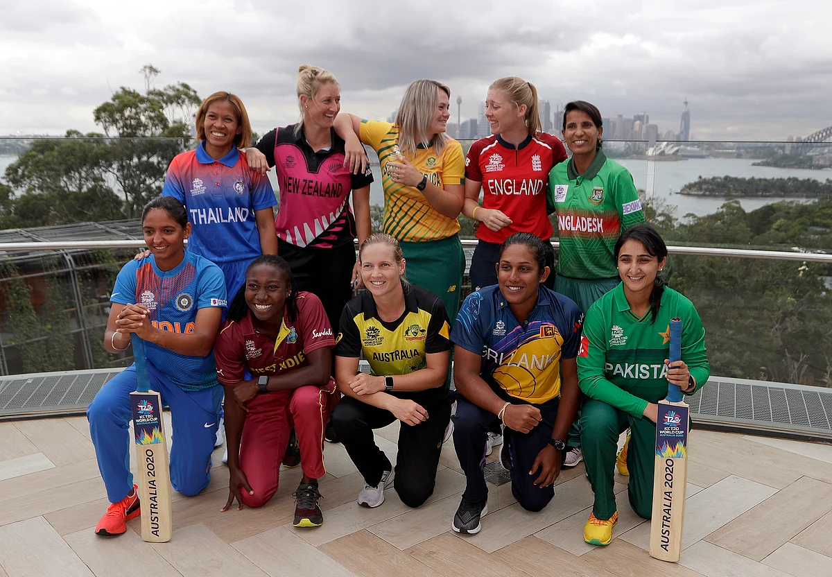 The captains of the 10 countries participating in the Women’s T20 World Cup pose fore a photo looking at the Sydney skyline, Monday, Feb. 17, 2020. 