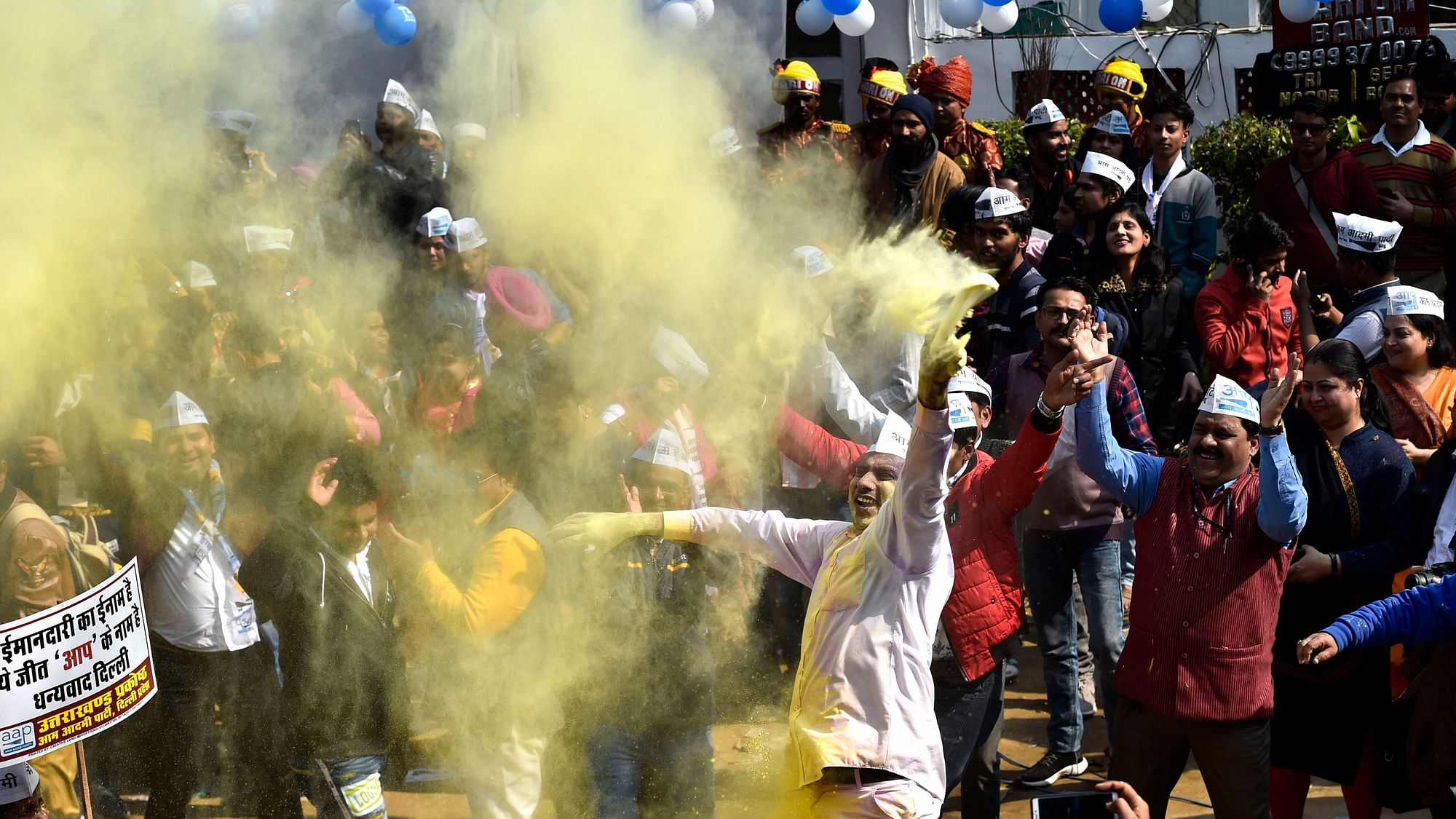 AAP supporters celebrate the party’s massive win in Delhi Assembly polls.