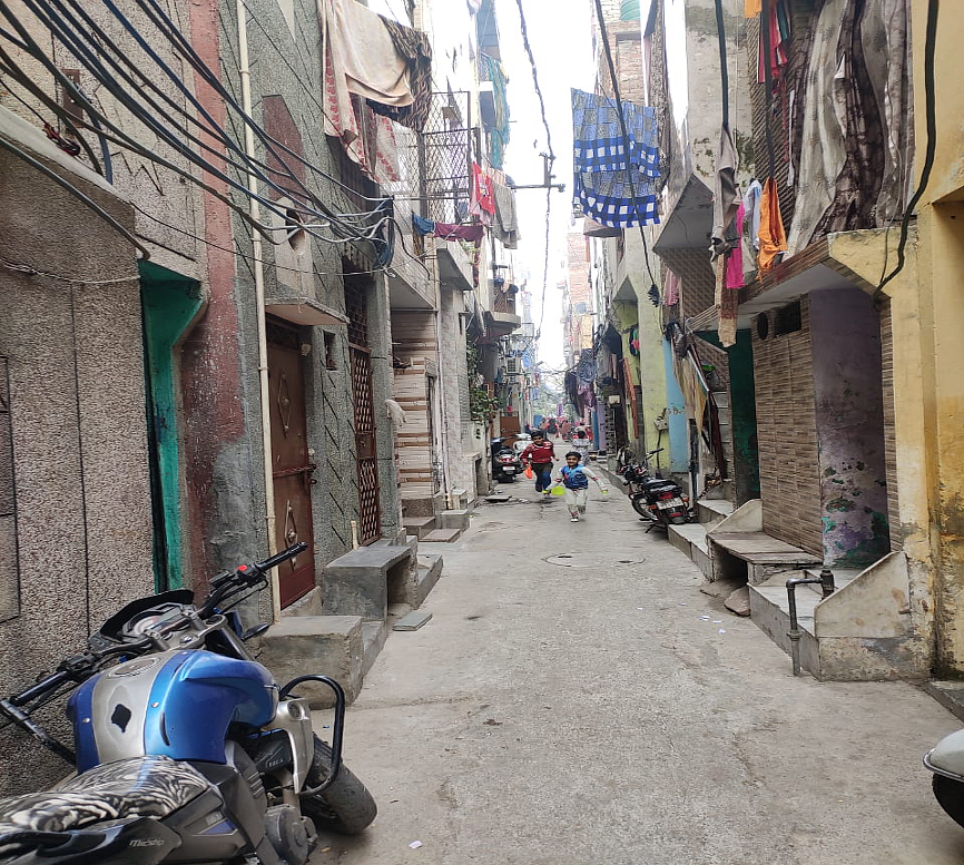 Narrow lanes separate semi-pucca houses in Mangolpuri.