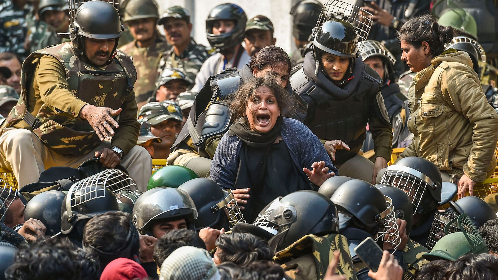 A woman protester shouts as police stops many during a march against the amended Citizenship Act, NRC and NPR, near Jamia Nagar on Monday.