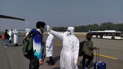 New Delhi: A thermal screening being carried out on the passengers arriving from the Chinese city of Wuhan, the epicentre of the novel coronavirus outbreak, at the IGI airport in New Delhi on Feb 2, 2020. National carrier Air India
