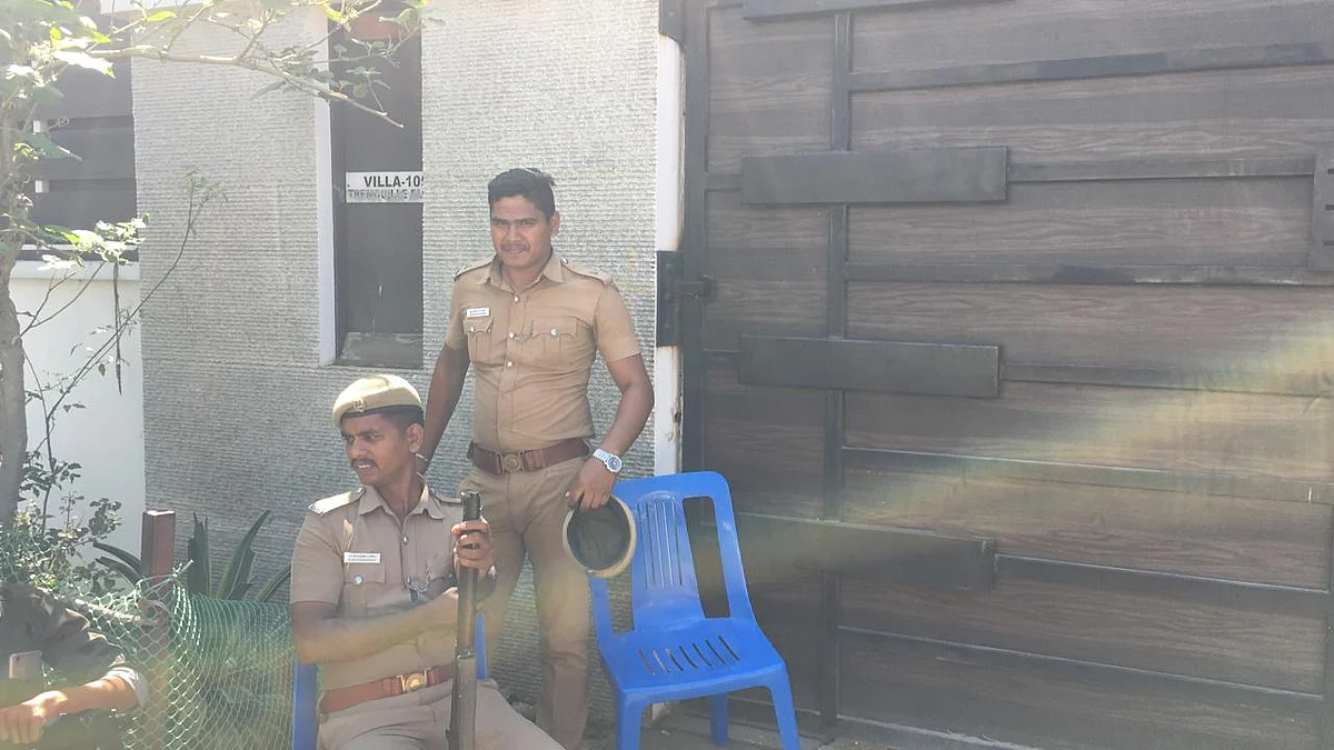 Officials at Vijay’s residence in Paniyur.