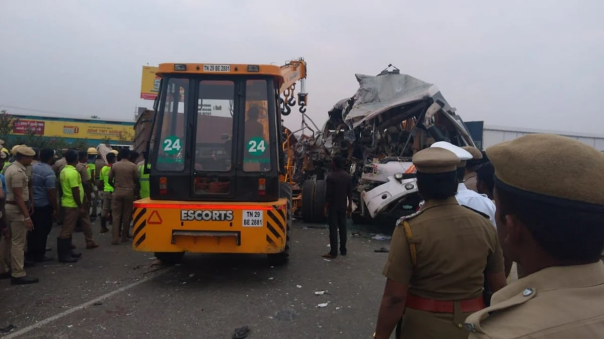 The lorry ran over the divider and rammed into the bus.