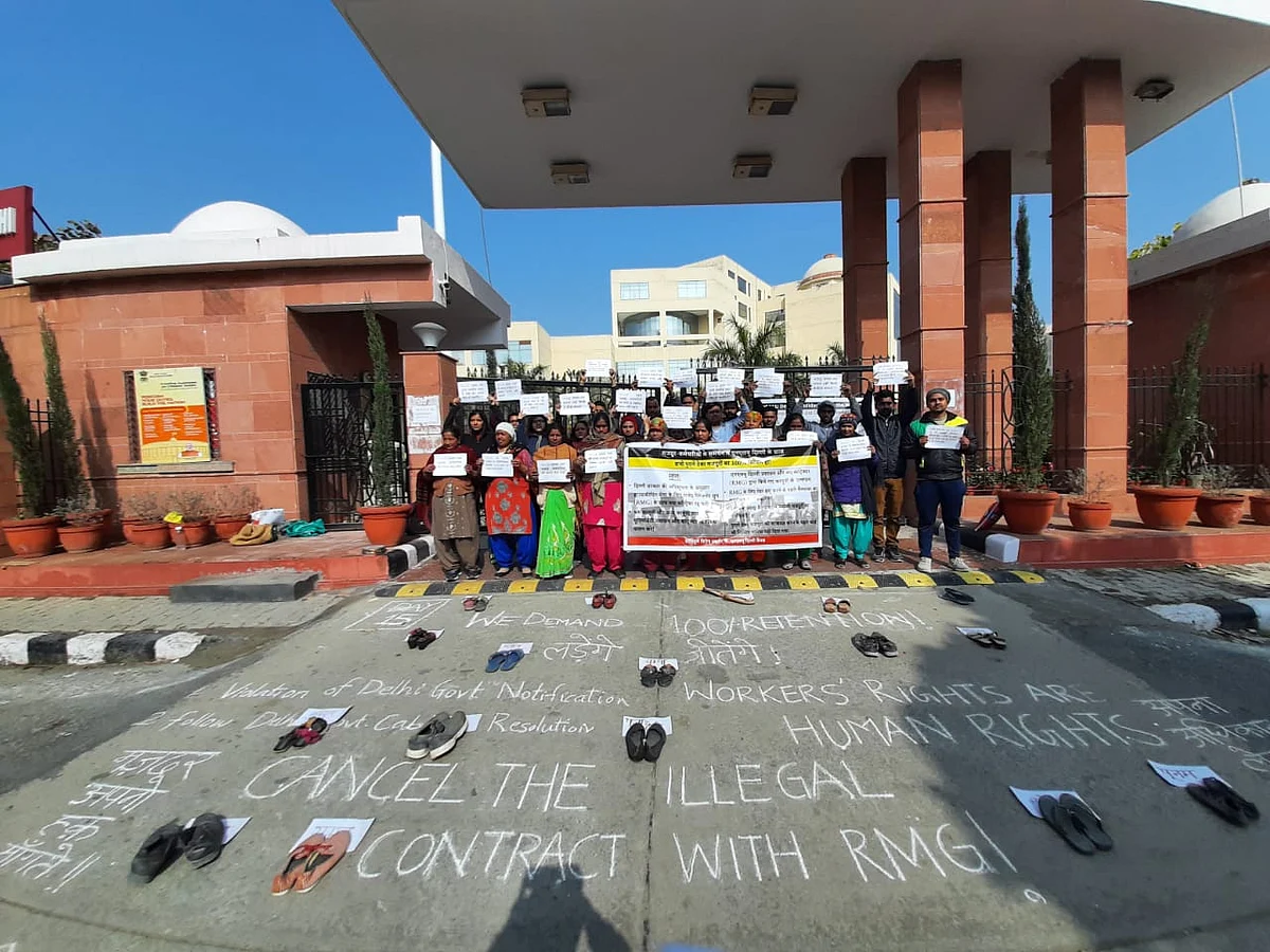 Workers protest their termination. 