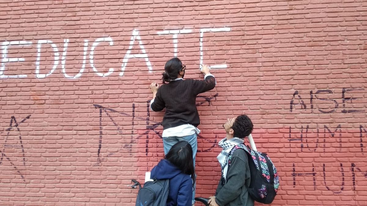 Meet the young graffiti artists at Jamia who are protesting with paint and brushes.