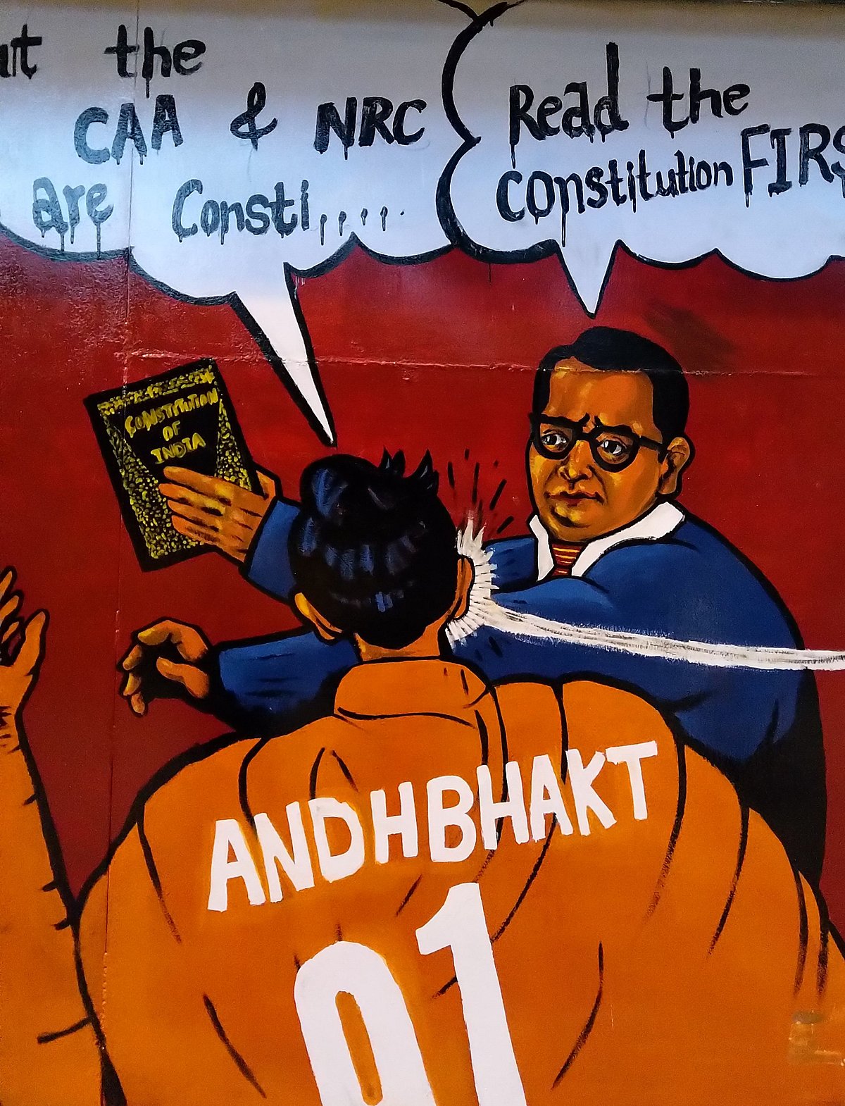 This artwork outside Jamia shows BR Ambedkar responding to the CAA with the Constitution. Such visuals were used across several anti-CAA protests in Delhi.&nbsp;