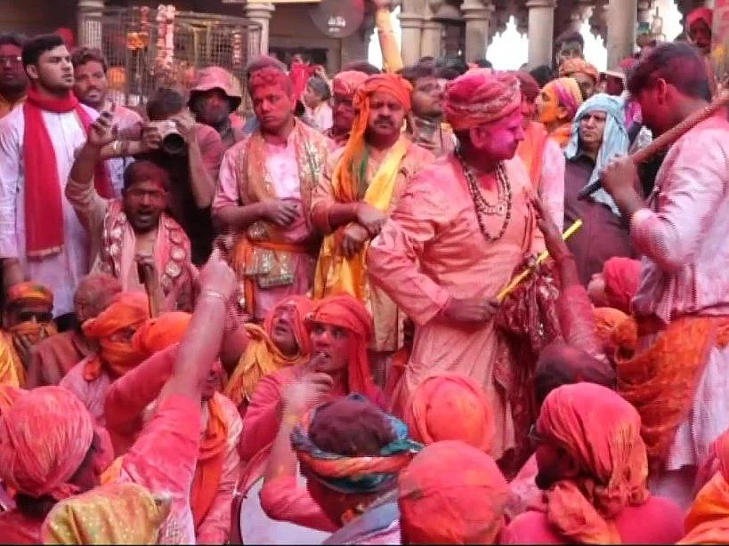 Laddu Holi being celebrated in Mathura.