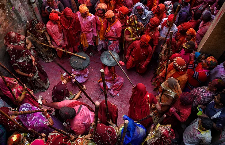 Lathmar holi being celebrated, where women of Barsana beat men from nearby villages.