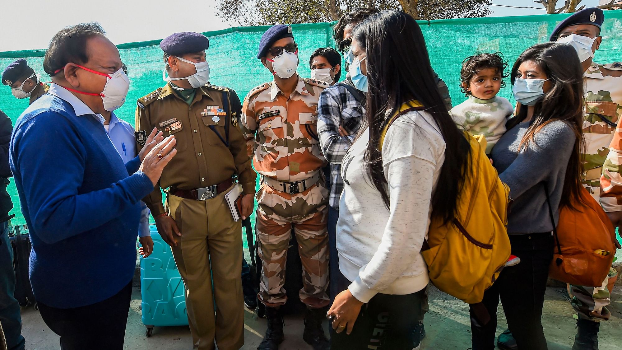 Union Health Minister Harsh Vardhan interacts with Wuhan-returned Indians after they were released from the ITBP quarantine facility at Chhawla, New Delhi, Monday, Feb. 17, 2020.