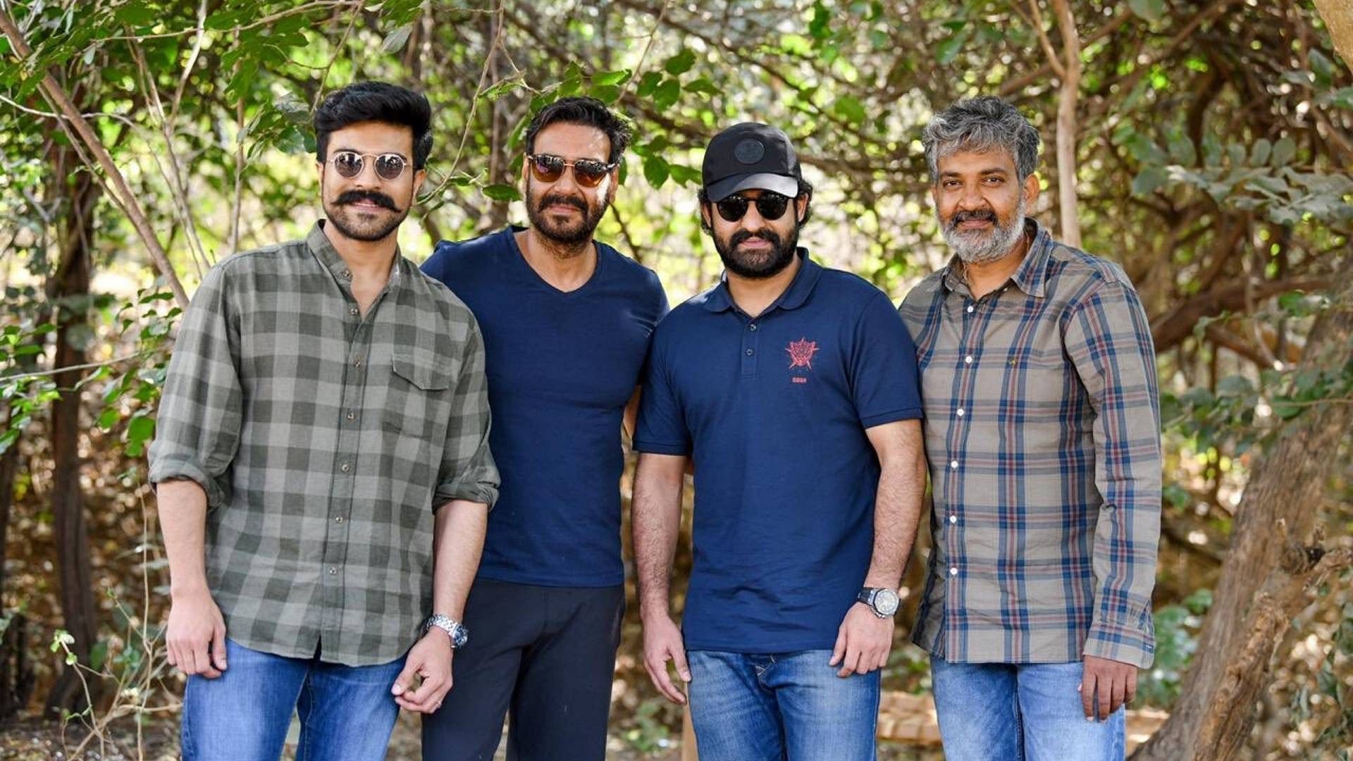SS Rajamouli on the sets of <i>RRR&nbsp;</i>with Jr NTR and Ajay Devgn.