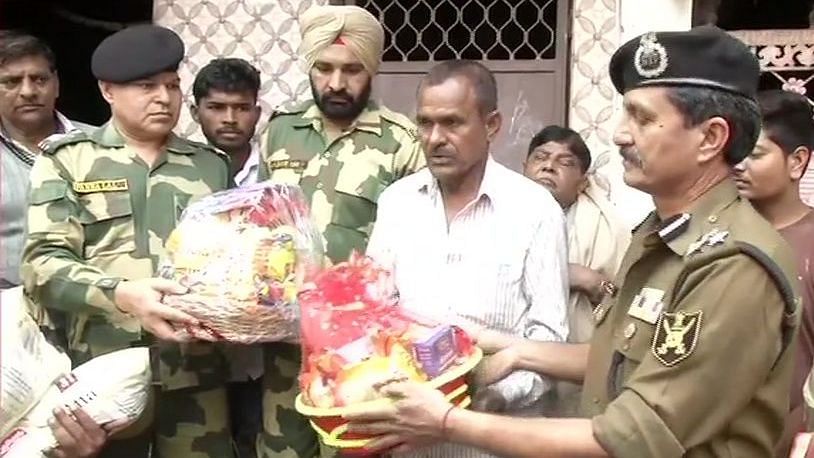 A team of Border Security Force visited the house of BSF constable Mohammad Anees, whose house in Khajuri Khas area was set on fire during Delhi violence.