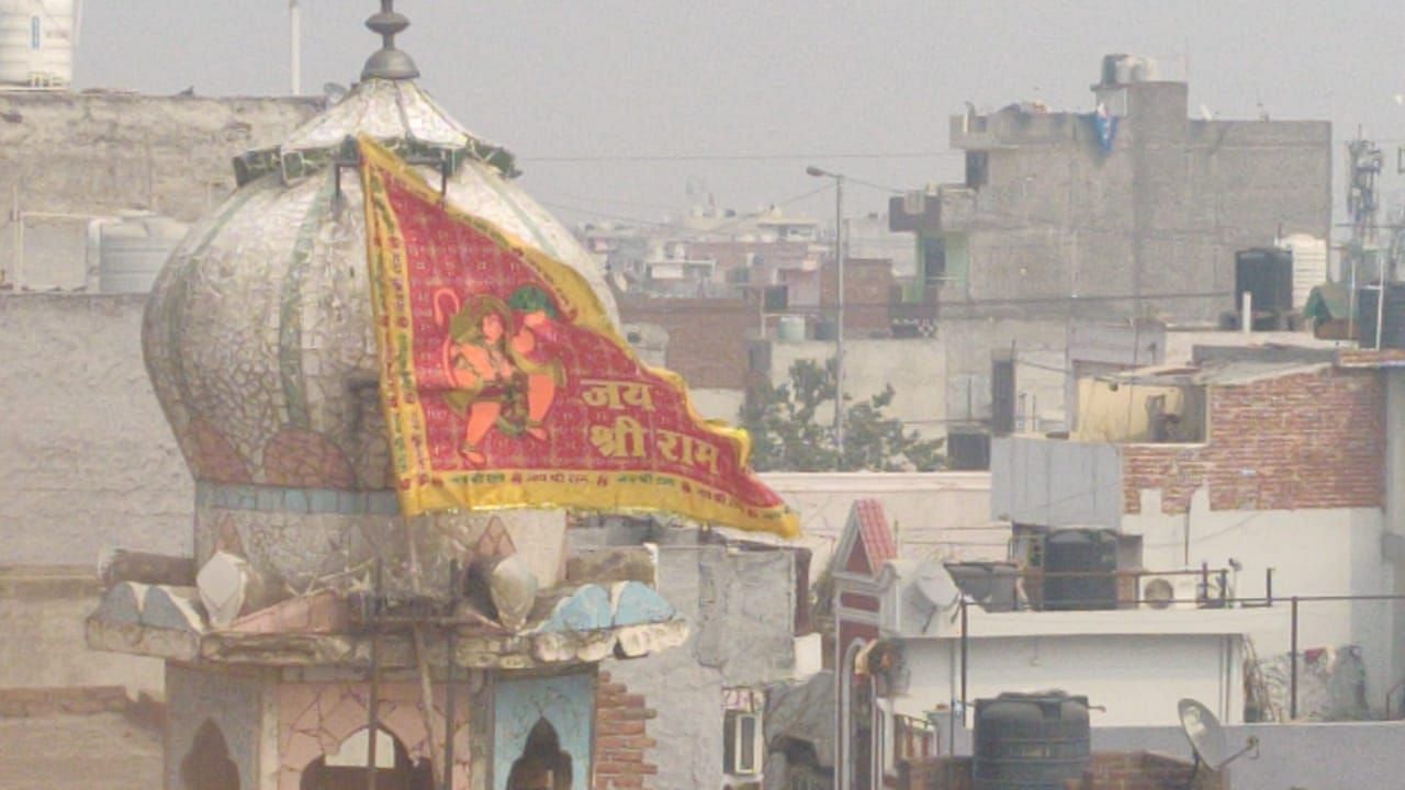 A day after a mosque was vandalised and set on fire in Ashok Nagar’s Gali No 5, the saffron flag placed on the dome of the mosque minar remains hoisted.