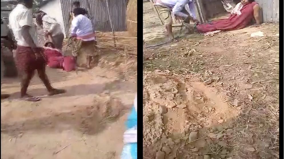 Screengrab of the viral video where a women can be seen being dragged and beaten in West Bengal.  