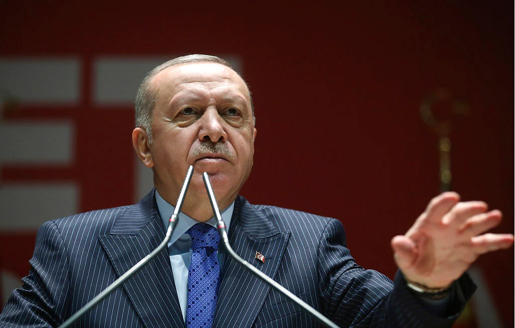 Turkish President Recep Tayyip Erdogan speaks to his ruling party members, in Ankara, Turkey, Thursday, 27 February.