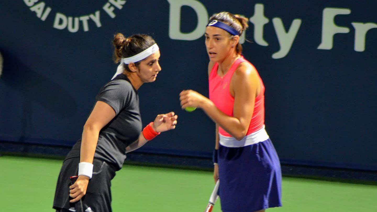 Sania Mirza (left) and Caroline Garcia lost 2-6, 4-6 in the second round against fifth seeds Saisai Zheng of China and Barbora Krejcikova of Czech Republic.