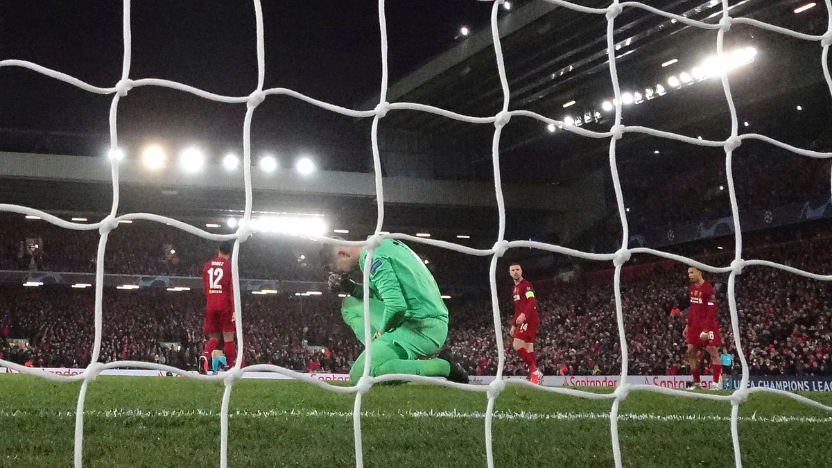 Liverpool’s goalkeeper Adrian reacts after he fails to save the ball as Atletico Madrid’s Marcos Llorente scores his side’s second goal at Anfield stadium in Liverpool on Wednesday.