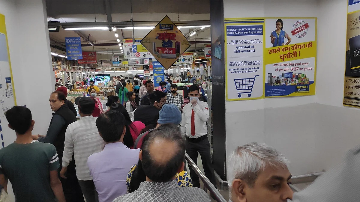 People engaged in panic buy in New Delhi after lockdown. 